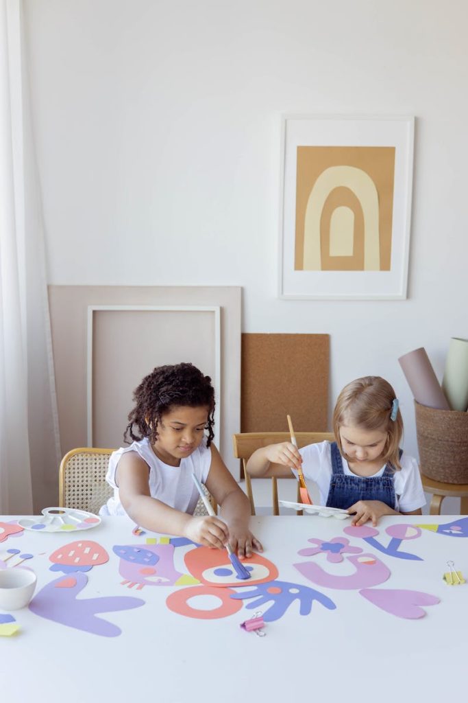 Two Kids Doing Some Artworks