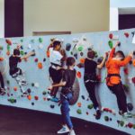 kids on test climb rock