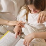 Mother and Daughter Reading a Book Together