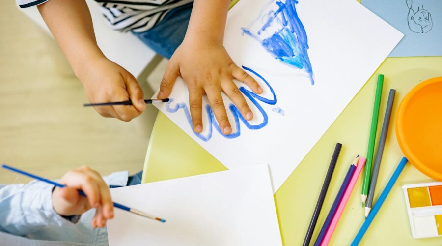 Person Tracing His Hand On Paper