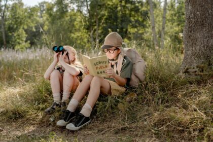 Blonde Girl Looking at the Binoculars