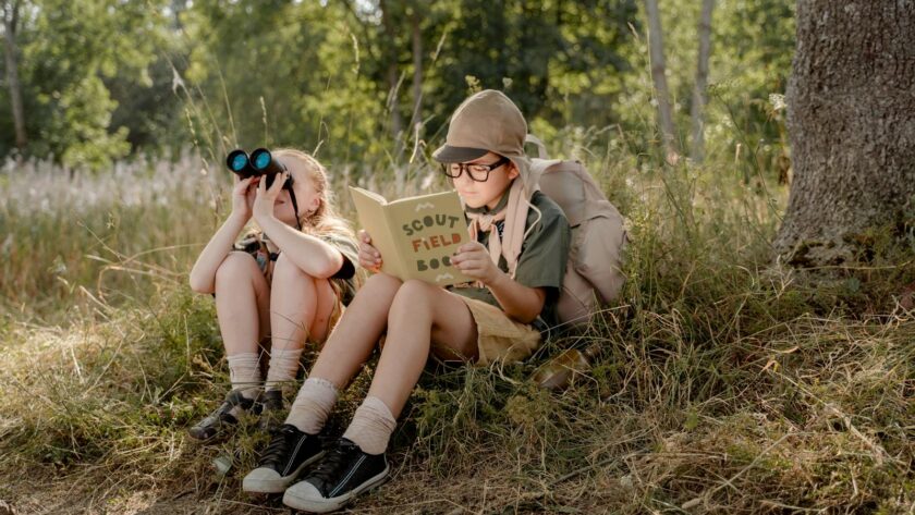 Blonde Girl Looking at the Binoculars