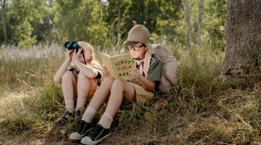 Blonde Girl Looking at the Binoculars