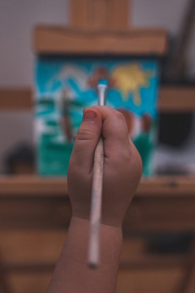 person holding white cotton buds